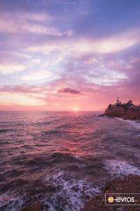 With the… purple of nature on the Red Rocks, in Alexandroupolis