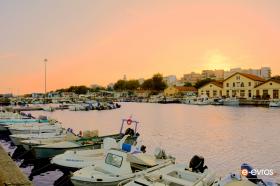 "When the sun goes down...the port entraces you".